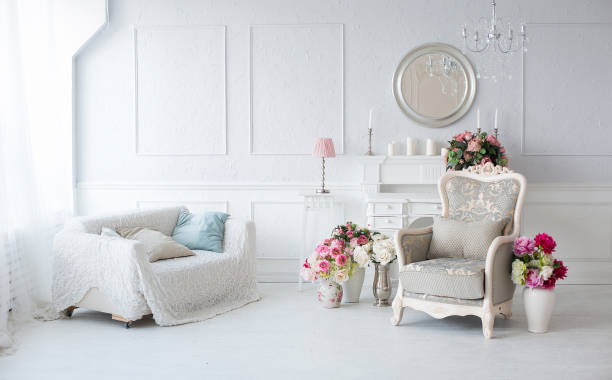 istock luxury clean bright white interior. a spacious room with sunlight and flowers in vases 1392159942