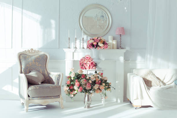 istock luxury clean bright white interior. a spacious room with sunlight and flowers in vases 1392160033
