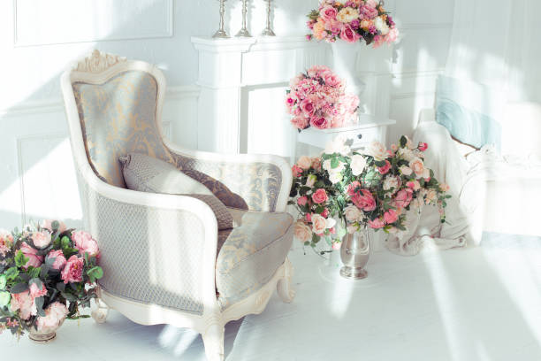 istock luxury clean bright white interior. a spacious room with sunlight and flowers in vases 1392160061