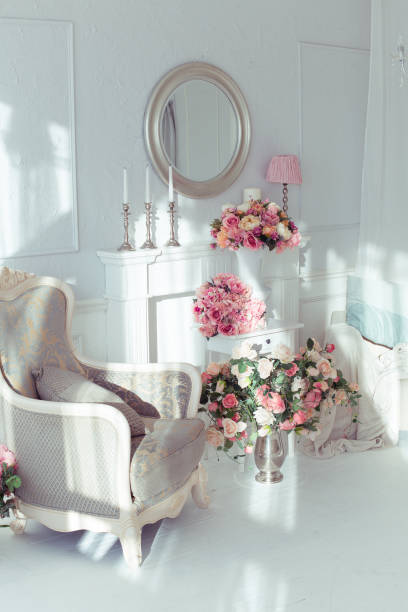 istock luxury clean bright white interior. a spacious room with sunlight and flowers in vases 1392160064