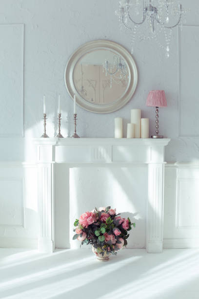 istock luxury clean bright white interior. a spacious room with sunlight and flowers in vases 1392160335
