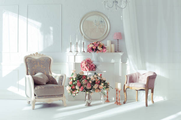 istock luxury clean bright white interior. a spacious room with sunlight and flowers in vases 1392160375