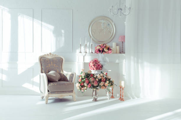 istock luxury clean bright white interior. a spacious room with sunlight and flowers in vases 1392160376