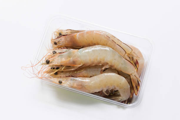 istock Fresh banana shrimp (Penaeus merguiensis) isolated on white background. 1392163159