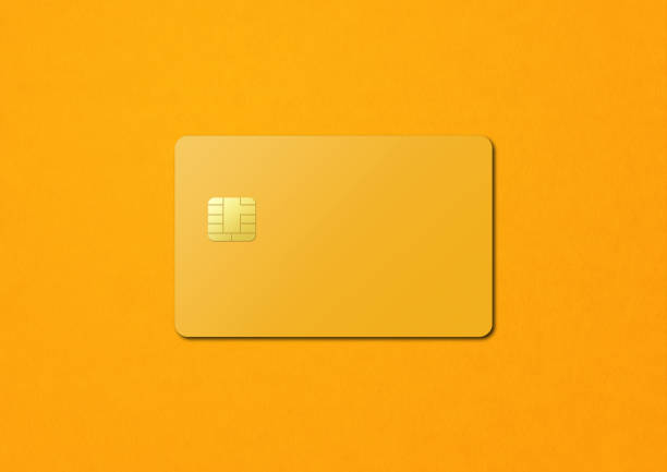 istock Yellow credit card on a color background 1392165147