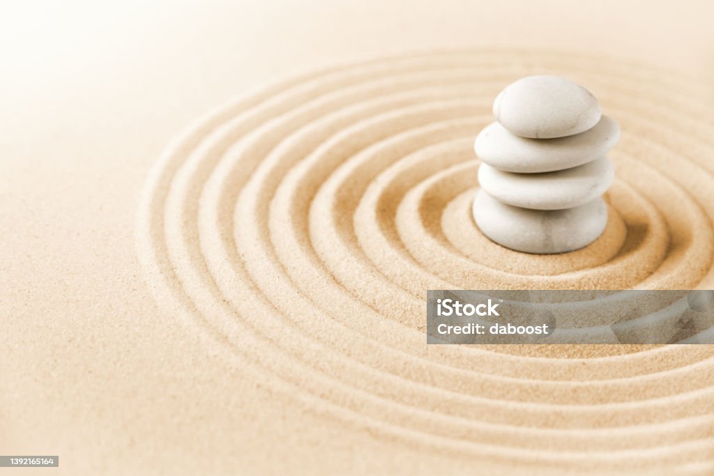 Zen japanese garden background White stones pile in the sand. Zen japanese garden background scene Abstract Stock Photo