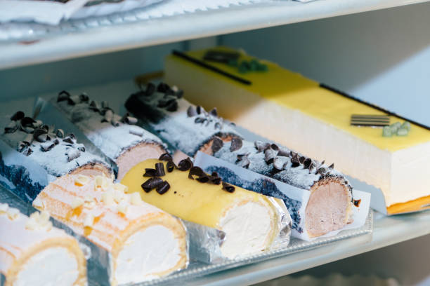 istock Elongated cakes inside a fridge in a pastry shop. 1392165236