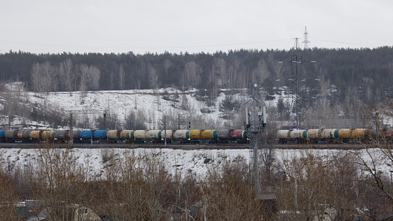 Ulyanovsk, Russia - April 3, 2022: A railway cars of largest gas producer and supplier Gazprom group on railroad.