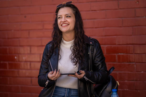 Girl is happy she won her mobile game