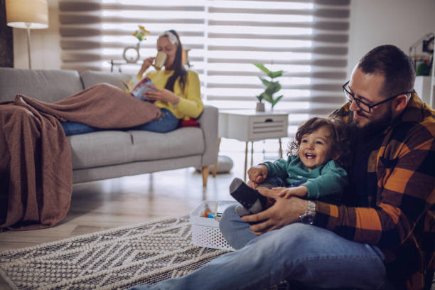 istock happy dad and mom with cute baby boy having fun 1392170768