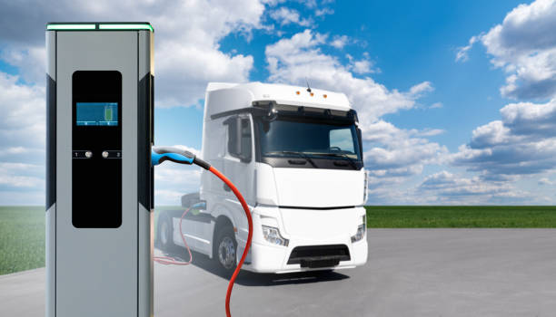 istock Electric truck with charging station 1392171613