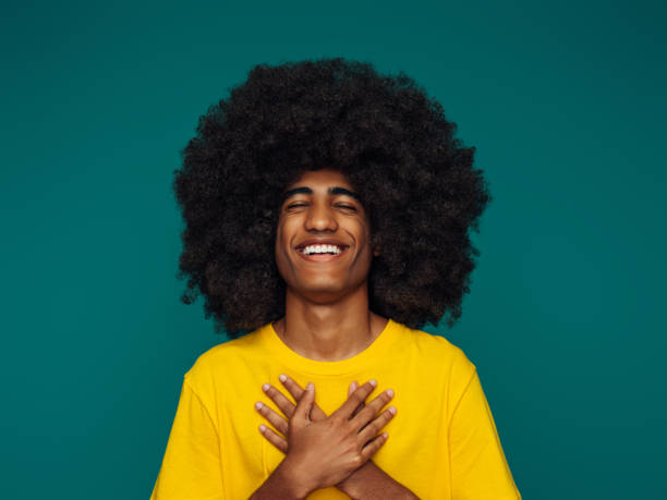 istock Portrait of funny afro guy 1392171941