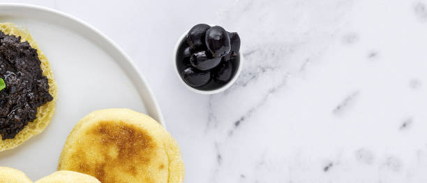 Homemade harcha semolina bread pancakes with olives mashed. Halal food concept. arab food