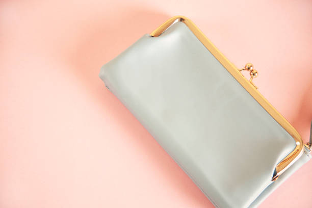 istock woman beautiful bag on the pink  table background 1392175027