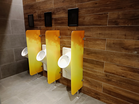 Public restroom Men's Urinal at a gas station