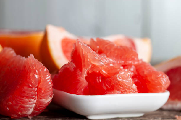 istock peeled and divided into parts ripe red grapefruit 1392183503