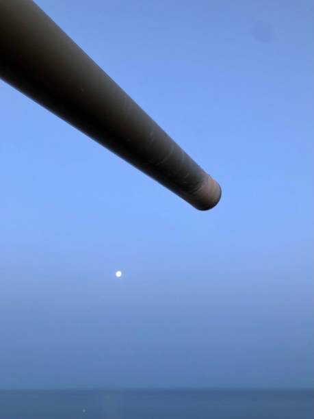 istock Cannon points to the moon lit sea 1392187853