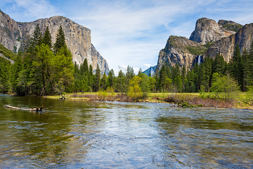 The Merced River running through Yosemite Valley in California, USA.