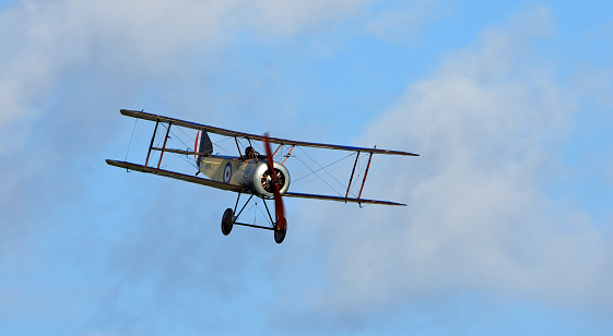 Ickwell, Bedfordshire, England - September 06, 2020: Vintage 1916  Sopwith Pup World War 1  aircraft in flight.