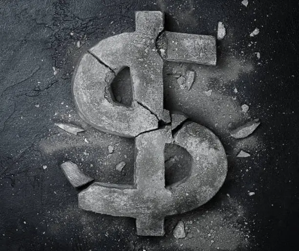 Photo of broken dollar sign