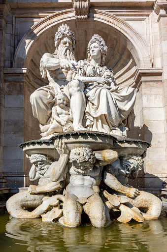 Neptune fountain on Albertinaplatz square in Vienna, Austria