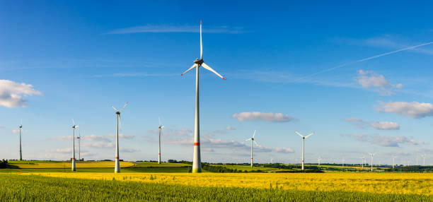 istock Wind turbines in agricultural landscape 1392197341