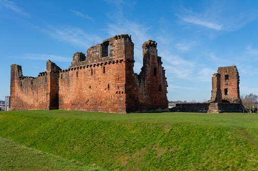 Penrith Castle on a beautiful spring day with blue skies behind.