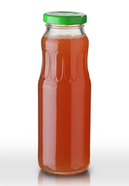 istock a small glass bottle with juice 1392199558