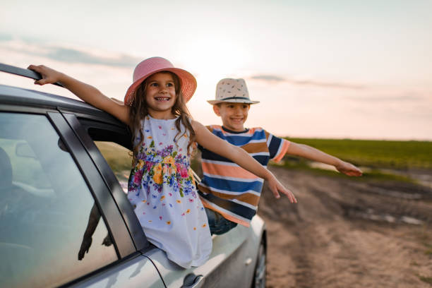 istock Beautiful children enjoying on a road trip 1392200687