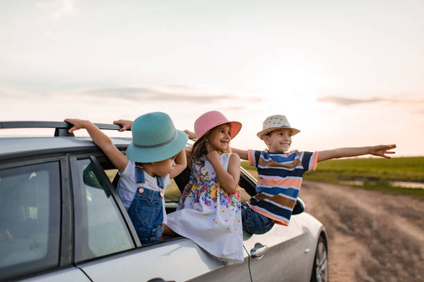 istock Beautiful children enjoying on a road trip 1392200738
