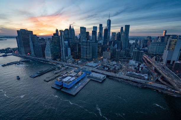 Aerial view of the Lower Manhattan in New York City as seen from a helicopter before the sunset