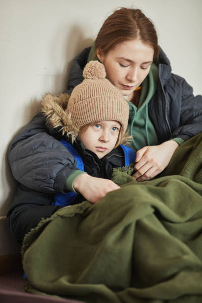 Little Boy in Refugee Shelter