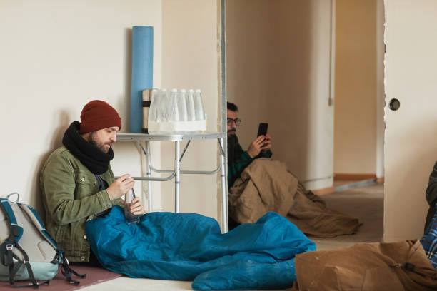 istock Homeless Man in Refugee Shelter 1392201915