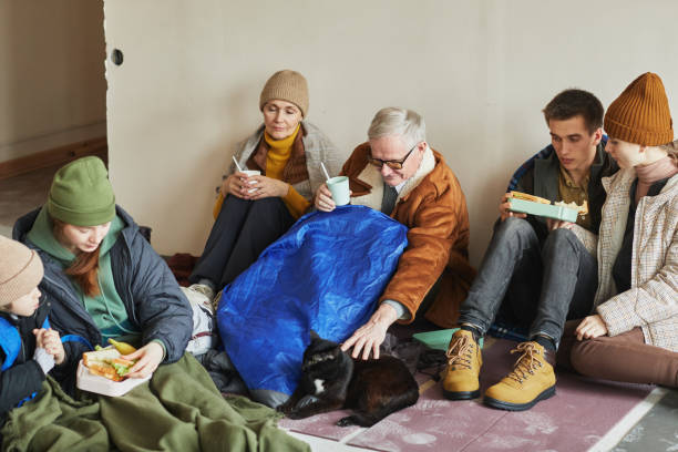 istock People Eating Food in Shelter 1392201934