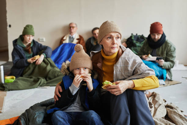istock Mother and Son Hiding in Shelter 1392201940
