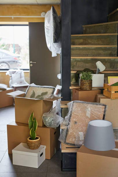 istock Unpacking Boxes in New House 1392203096