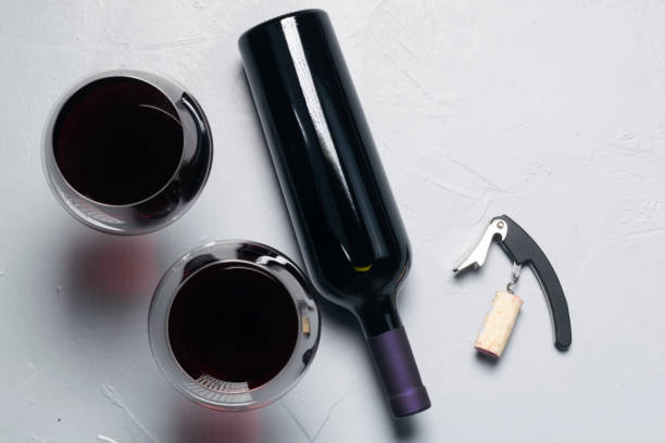istock Aerial view of a bottle , glasses and corkscrew. 1392203383