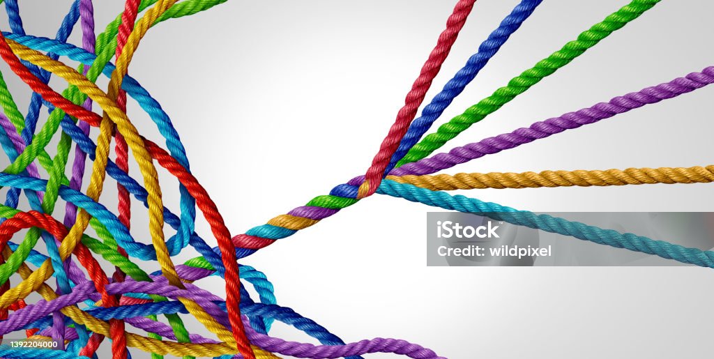Concept Of Organizing Concept of organizing from mismanagement to managed success as a tangled group of ropes with another team of organized ropes succeeding. Order Stock Photo