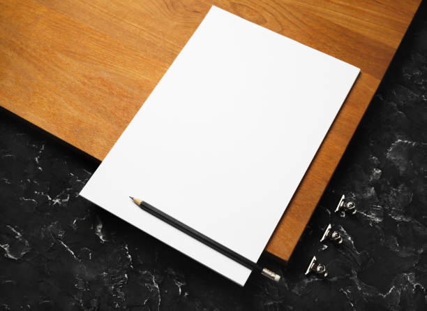 istock Letterhead, pencil, metal clips 1392204279