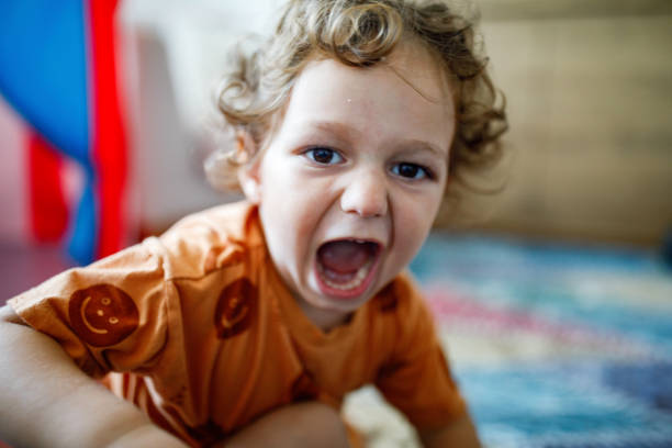 istock Baby boy playing at home 1392204369
