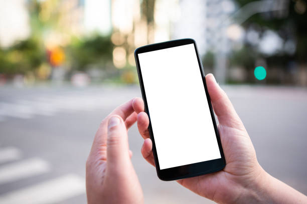 istock Brazilian woman working and using technology in the city 1392205574