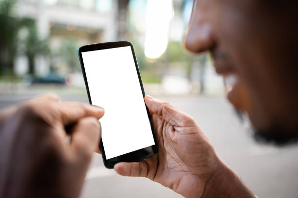 istock Brazilian man working and using technology in the city 1392206137