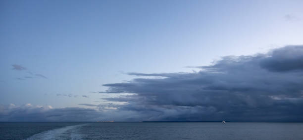 istock Dark Cloudscape over the West Coast of Pacific Ocean. 1392224728
