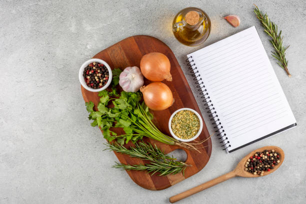 istock Cookbook with ingredients on the table.Recipe book. 1392224798