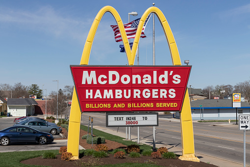 Richmond - Circa April 2022: McDonald's Restaurant. McDonald's is offering employees higher hourly wages, paid time off, backup child care and tuition payments.