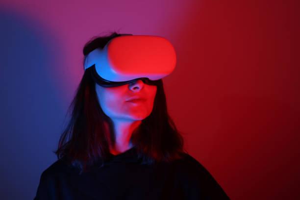 istock Woman wearing VR Glasses 1392228955