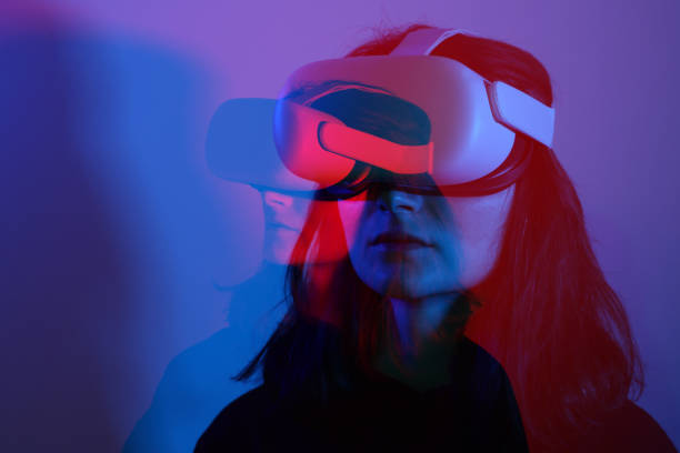 istock Woman wearing VR Glasses 1392228963
