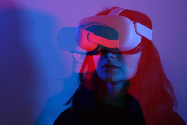 Photo of Woman wearing VR Glasses