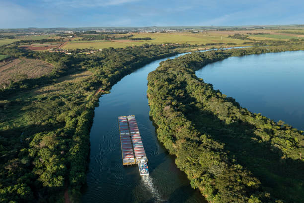 istock grain transport barge going up the tiete river - tiete-parana waterway 1392235263