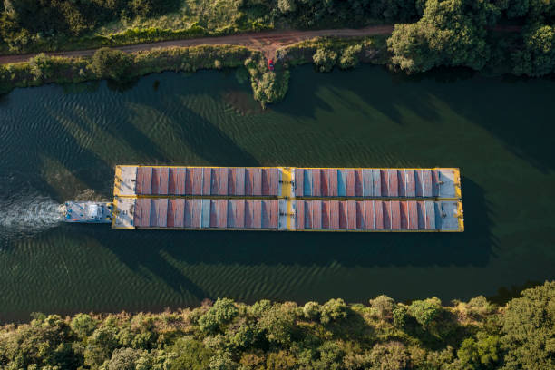 istock grain transport barge going up the tiete river - tiete-parana waterway 1392235280